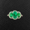 Three Oval Emerald Ring with Diamonds