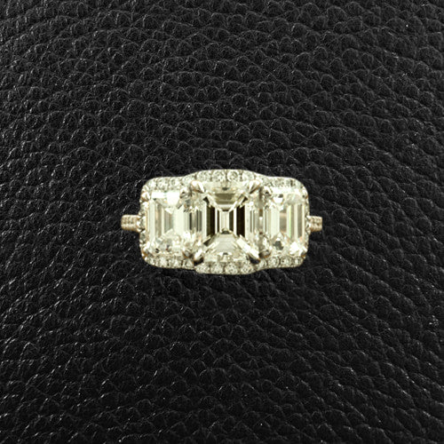Triple Emerald cut Diamond Ring with Halo