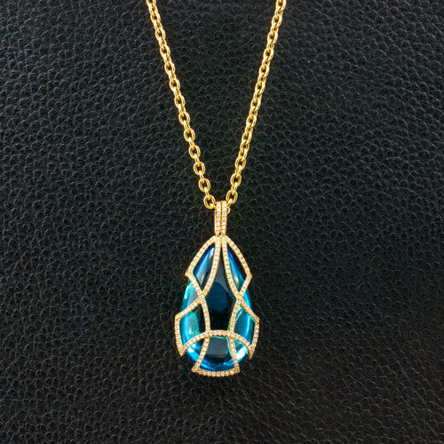 Diamond Tear Drop Cage Necklace with Blue Topaz Insert
