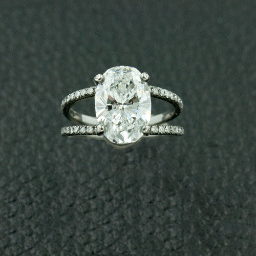 Center Oval Diamond Ring