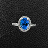 Oval Tanzanite & Diamond Halo Ring