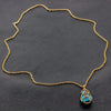 Diamond Tear Drop Cage Necklace with Blue Topaz Insert